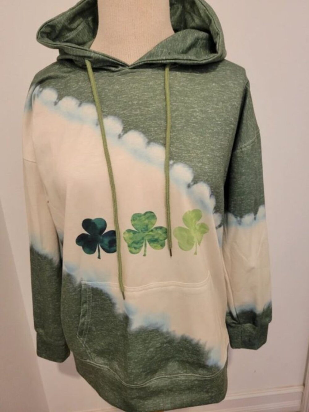 Green and White shamrock hoodie.  Size M.